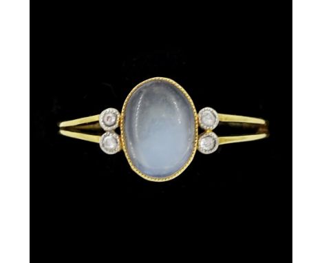 Early 20th century gold milgrain set oval moonstone and old cut diamond ring, stamped 18ctCondition Report:Approx 2.1gm, size