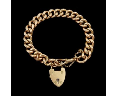 9ct gold curb link chain bracelet, with heart locket charmCondition Report:Approx 17.3gm, 19cm, hollow links, tested 9ct