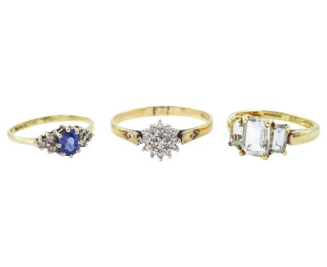 Three 9ct gold rings including three stone aquamarine, sapphire and diamond cluster and a diamond cluster, all hallmarkedCond
