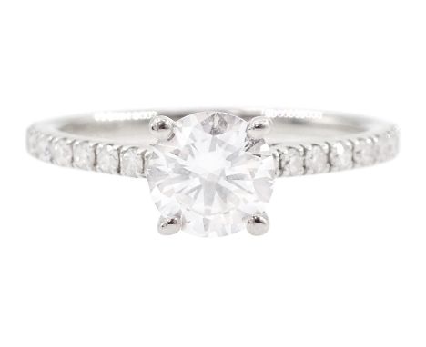 18ct white gold single stone round brilliant cut diamond ring, with diamond set shoulders, hallmarked, principal diamond 0.71
