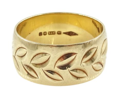 9ct gold wedding ring with engraved leaf decoration, London 1992Condition Report:Approx 5.8gm, ring size P, depth = 9mm