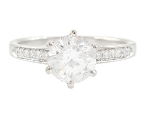 18ct white gold single stone round brilliant cut diamond ring, with diamond set shoulders, stamped 750, principal diamond wei