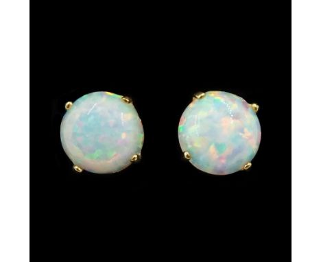 Pair of 9ct gold opal stud earrings, stampedCondition Report:Approx 0.3gm, diameter= 4.9mm, good condition