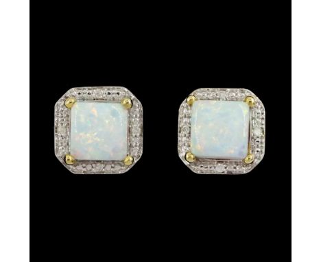 Pair of 9ct gold opal and diamond stud earrings, stamped 375Condition Report:Approx 1.55gm, diameter = 7.9mm, good condition