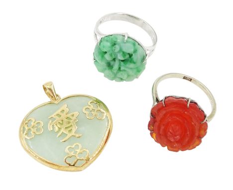Two 9ct white gold rings including jade and carnelian, both with carved floral decoration and a 9ct gold jade heart pendantCo