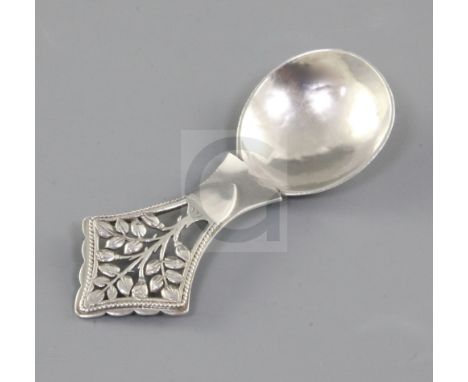 A George V Arts & Crafts silver "Tree of Life" caddy spoon, by Henry George Murphy, hallmarked London 1929 with the Falcon St