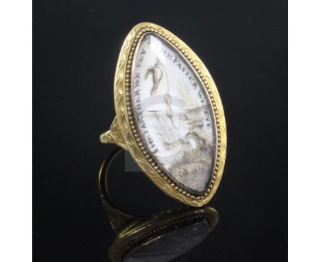 An early 19th century gold and ivory mourning ring, of navette shape, the panel decorated with bird and a distant three maste