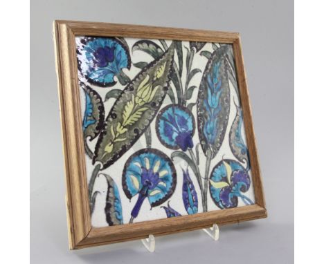 A large William de Morgan Iznik style pottery tile, painted with saf leaves and flowers, impressed Sands End pottery mark, 23