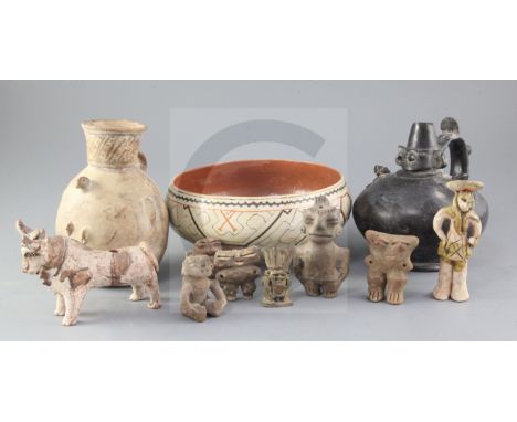 A group of pre-Columbian and Peruvian pottery vessels and figures, including a blackware Sican Reyna stirrup vessel, 15.5cm h