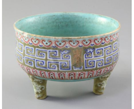 A rare Chinese enamelled porcelain tripod censer, Daoguang mark and of the period (1821-50), the pea green ground exterior de