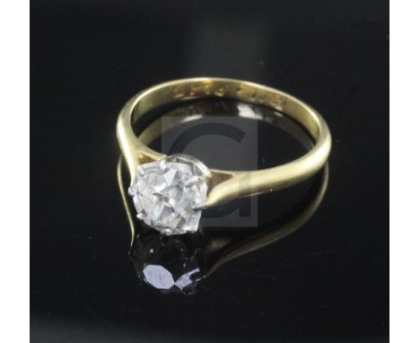 An 18ct gold, platinum and solitaire diamond ring, size L.
