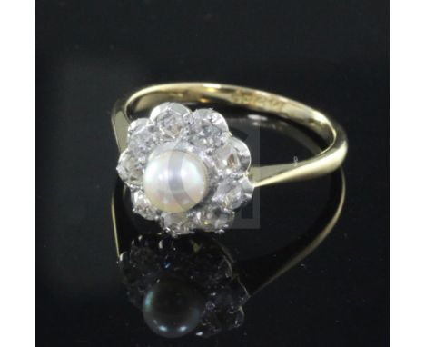 A mid 20th century 18ct gold and platinum, cultured pearl and diamond cluster ring, size N.