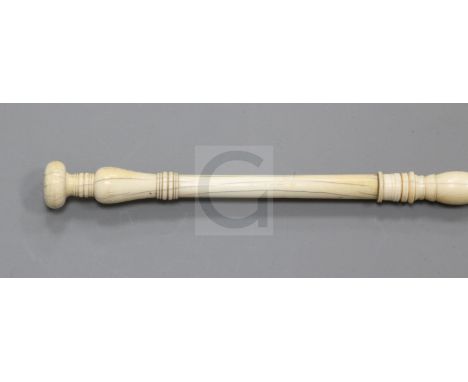 A 19th century Indian ivory walking stick, with ring turned decoration, 30.5in.