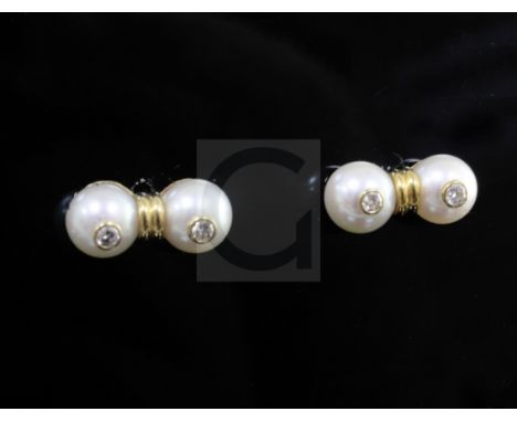 A pair of 18ct gold and diamond set twin cultured pearl ear studs.From the estate of the late Sheila Farebrother.
