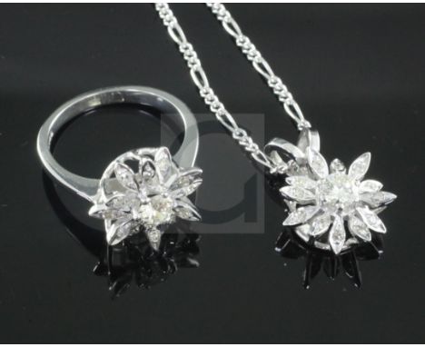 An 18ct white gold and diamond cluster ring in the form of a flowerhead and a matching pendant, 18ct white gold setting (form