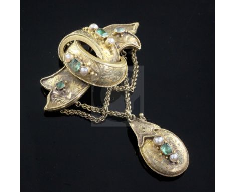 A Victorian Celtic Revival gold, emerald and pearl set drop pendant locket brooch, 67mm.