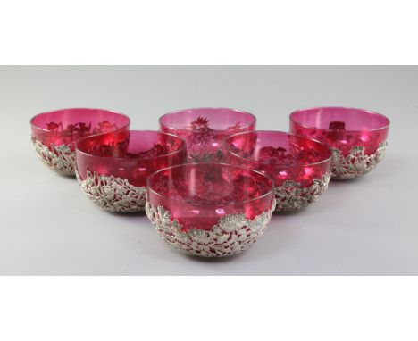 A set of six late 19th/early 20th century Chinese Export silver finger bowls by Wang Hing & Co, Hong Kong, with ruby glass li