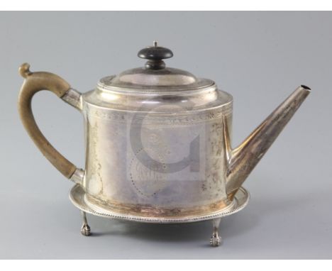 A George III silver teapot and stand, by Hester Bateman, of oval form with beaded borders and engraved decoration and monogra