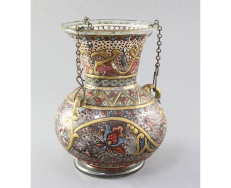 An Islamic painted glass mosque lamp, Ottoman, late 19th / early 20th century, with raised decoration of flowers, leaves and 