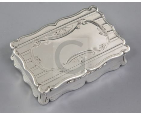 A Victorian silver snuff box, by Edward Smith, hallmarked Birmingham 1857, of rectangular form with shaped scalloped sides an