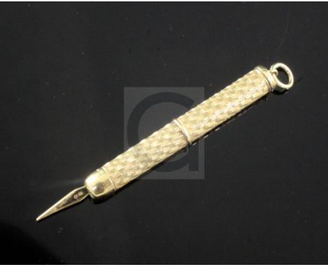 An early 1970's Cartier engine turned 18ct gold toothpick, signed and numbered P5574 P5957, 48mm.From the estate of the late 