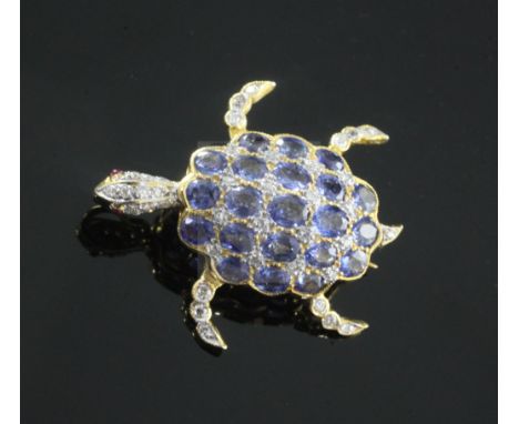 An 18ct gold, sapphire, diamond and cabochon ruby set turtle pendant brooch, with articulating head, feet and tail, 26mm.From
