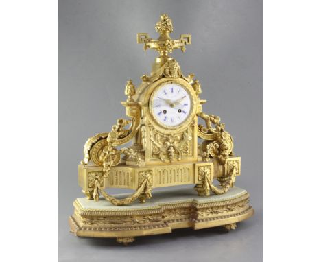 A third quarter of the 19th century French ormolu mantel clock, Raingo Freres, Paris, the arched case with urn and volute mou