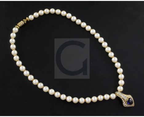 An 18ct gold, cultured pearl necklace with heart shaped cabochon sapphire and baguette and round cut diamond set pendant, the