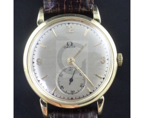 A gentleman's 1940's 18ct gold Omega manual wind "bumper" movement wrist watch, with baton and quarterly Arabic numerals and 