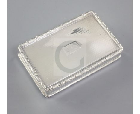 A William IV engine turned silver snuff box, by Edward Smith, hallmarked Birmingham 1831, of rectangular form, with cast and 