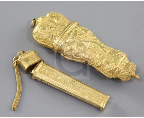 A late 18th century German ormolu etui, fitted with three tools, and a similar needlecase, 4in. and 3.25in.