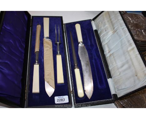 A cased three piece Carving set together with a cased two piece Carving set (fork missing)