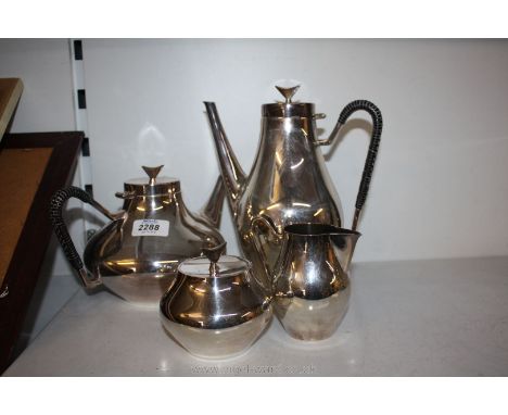 A plated teaset including teapot, water jug/coffee pot, cream jug and lidded sugar bowl