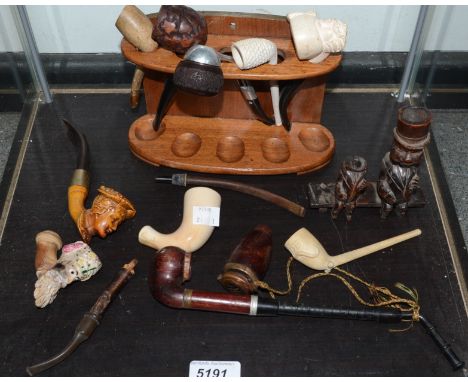Smoking Interest - a treen pipe rack; pipes including meerschaum, clay, novelty, etc