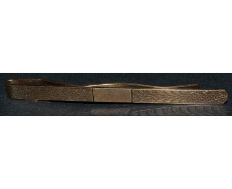 A 9ct gold tie clip (7.7g)