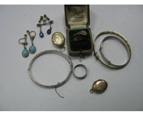 A Hallmarked Silver Child's Expanding Bangle, with allover foliate decoration, another similar hinged bangle, a "Rolled Gold"