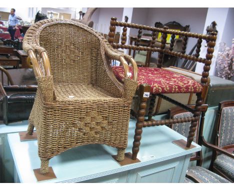 XIX Century Walnut Corner Bobbin Chair, with a upholstered seat, together with a child's wicker chair, with bentwood arms. (2