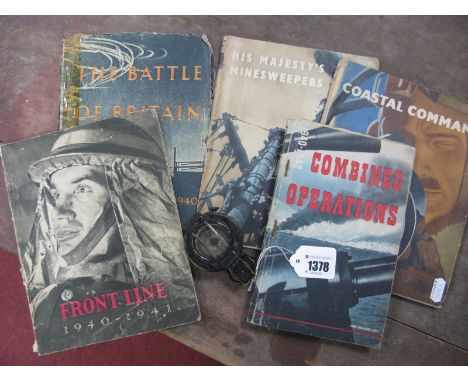 A WWII Field Compass, base marked '1942 MK III No 186886 by T.G. Co Ltd', and a selection of WWII stationary office booklets.