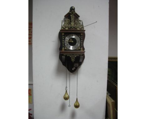 A Dutch Wall Clock, with German movement and brass pear drop weights.