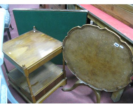 A Walnut Pedestal Table, with a pie crust top, together with a yew wood two tier lamp table, and a folding bridge table. (3)