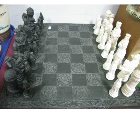 A Resin Chess Set, in black and white.
