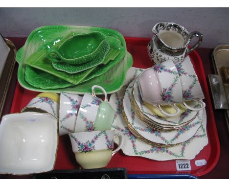 R. Winton Hand Painted Floral Tea Service of nineteen pieces with harlequin lower bands, shorter and other green salad servin
