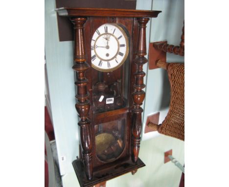 A XIX Century Walnut Cased Viennese Wall Clock, having subsidiary seconds dial to white enamel dial.
