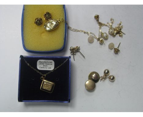 A Pair of 9ct Gold Earstuds, of flower head design, another similar pair, a pair of plain ball  earstuds,stamped "375" to but