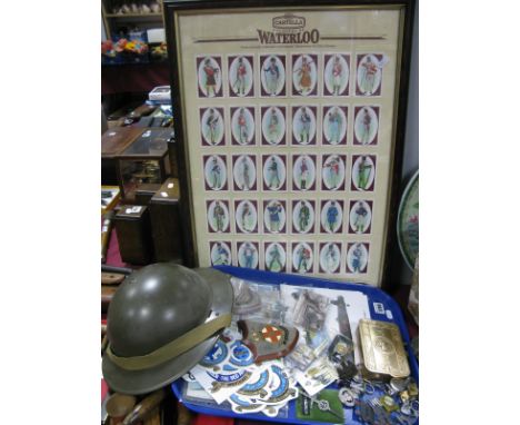 A Reproduction WWI Christmas Tin, and imitation British Military helmet, RAF car stickers, key rings, cigarette cards, commem