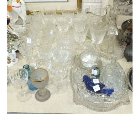 A collection of drinking glasses, a decanter and other glassware.