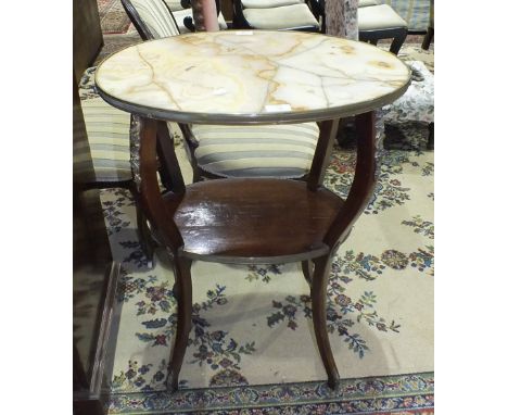 A late-19th century walnut étagère, the oval marble top (a/f) on cabriole legs joined by a shelf and overall gilt metal mount