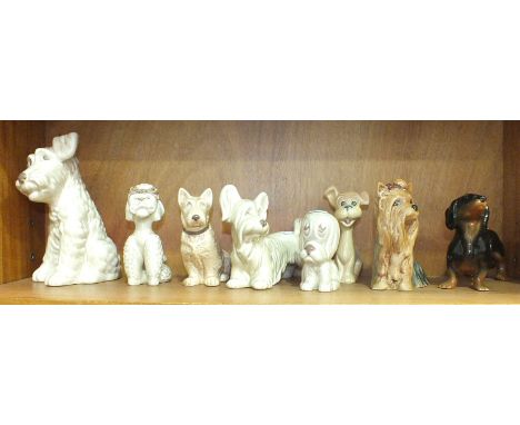 A collection of eight SylvaC ceramic dog ornaments, including Yorkshire Terrier 5027, Seated Scottie Dog 1205, Comical Skye T