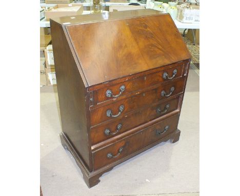 A reproduction mahogany Georgian-style bureau, the fall-front above four graduated long drawers, on bracket feet, 76cm wide, 