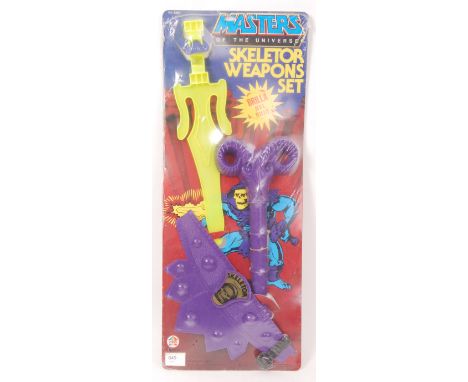 A rare Masters Of The Universe 1980's ' Skeletor Weapons Set ' with 'Glo-In-Dark' features. Factory sealed, within it's origi